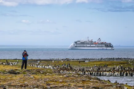 Pinguin Island with Aroura expedition ship in the background