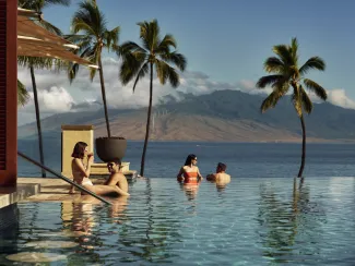 The White Lotus Bar and exclusive Poolside Escape cabana.